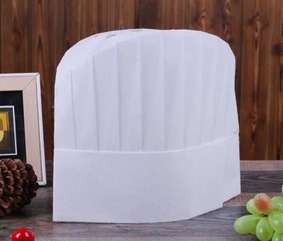 China Biodegradable Disposable Adjustable White Nonwoven Oval Kitchen Restaurant Top Breathable Hat for sale