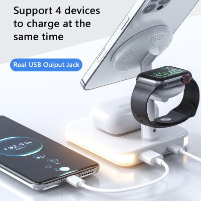 China Smart Watch Special Sales 15W Portable Phone Holder Magnetic Wireless Charging 4-in-1 Stand For Mobile Phone Smart Watch Earphone for sale