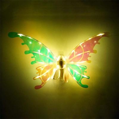 China Holiday Decorations 2023New Electric Butterfly Flies Electric Movable Fairy Flies Led Light Dress Flies Toys Party Decorations for sale