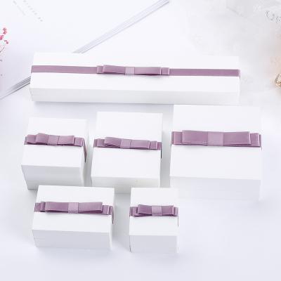 China Plastic Korean Version of Exquisite Ring Jewelry Box Series White Bracelet Necklace Packaging Box Jewelry Packaging Wholesale for sale