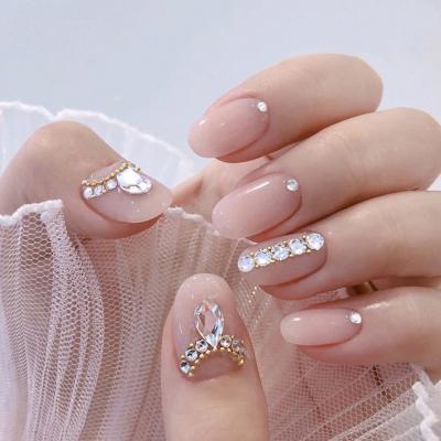 China Amazon Hot Private Label Elegant Lady Flesh Pink Almond Design Nails With Full Cover Rhinestone Press On Nails With Glue Nail Art for sale