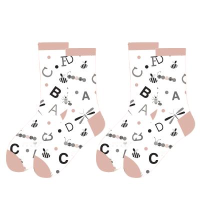 China Wholesale custom made cartoon sporty cute pattern jacquard fashion tube crew unisex happy socks for sale