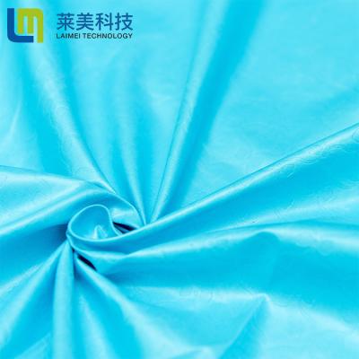 China Upholstery Fabric Memory Embossed Bed Fabric Embossed Flower Design Fabric for sale