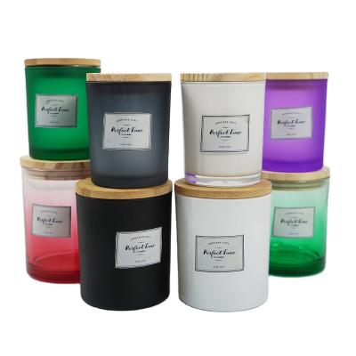 China Gift & Craft Wholesale Customized Luxury Empty Glass Candle Jars With Lids Colorful Candle Jar For Candle Making for sale