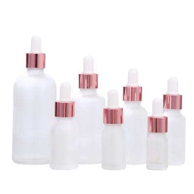 China Personal Care 30ml Gel Glass Lotion Bottle Cosmetic Serum Bottle With Rose Gold Dropper for sale