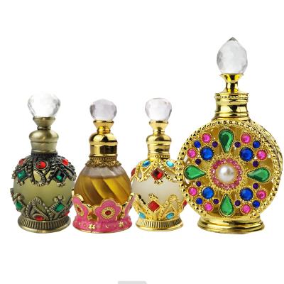 China Personal Care 15ml Luxury Vintage Metal Oil Essence Glass Arabian Oil Bottle for sale