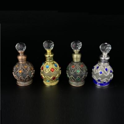 China Personal Care 15ml Dubai Metal Essential Oil Perfume Attar Bottle Luxury Arabic Indian for sale