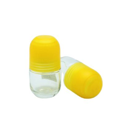 China Personal Care 50ml Clear Deodorant Perfume Roll On Glass Bottle With Big Roller for sale