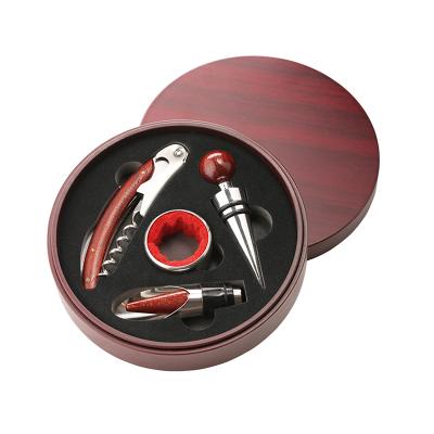 China Stocked Box Wine Opener Wood Material Round Gift Box Set With 4 Pieces Accessories for sale