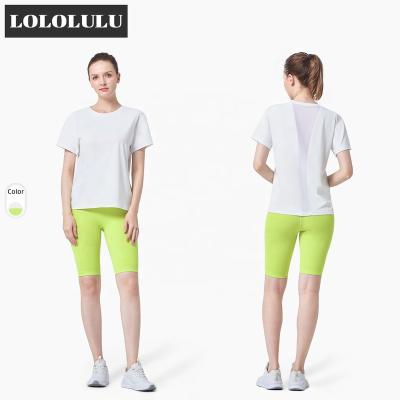 China Women Breathable T-shirt 2 Piece Yoga Equipment Sets Complete Shorts Biker Shorts No Net Yarn Workout Sexy Clothes Line Tee for sale