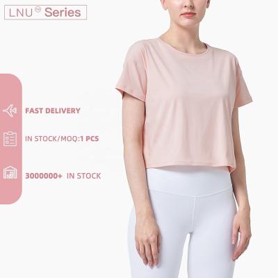 China Dropshipping Breathable Oversized T-shirt Round Neck Stitches Women Refine Loose Fit Yoga T-shirt for sale