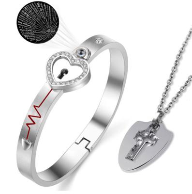 China Gifts A Set Stainless Steel Jewelry Heart Locks 100 Tongue Couple I Love You Bracelet With Key Necklace for sale