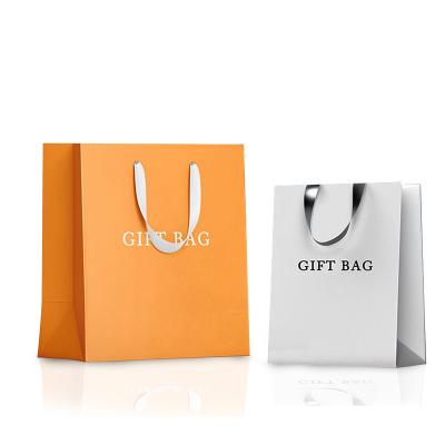 China Excellent Quality Materials Recycled Promotional Customized Customized Luxury Clothes Packing Paper Bags Shopping Bag With Ribbon Handle for sale