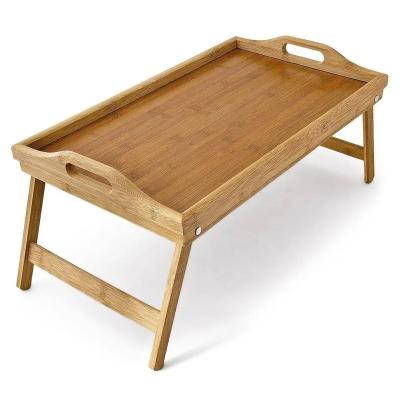 China Sustainable bamboo wooden bed tray table with folding legs, and breakfast tray acacia bed table and wooden bed tray with legs for sale