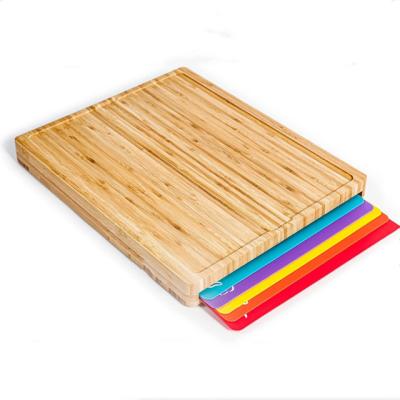 China Viable bamboo cutting board with plastic drawers chopper with tray for sale