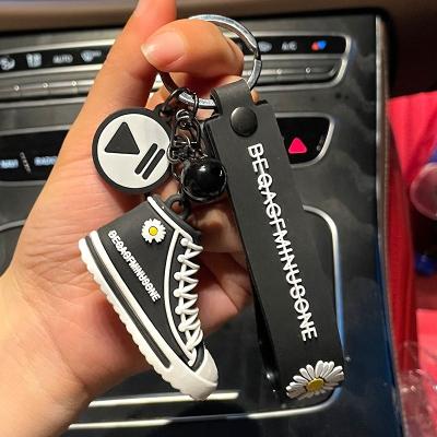 China 2022 New Mini Creative Decoration Rubber Reverse 3D Sports Shoes Key Chain With Box for sale