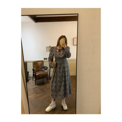 China Autumn New Style Retro Knee Length Anti-Static Loose Hollow Round Neck Floral Dress for sale