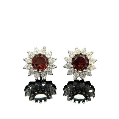 China FASHIONABLE Retro Noble Flower Luxury High Quality Shining Jewelry S925 Sterling Silver Inlaid Red Red Crystal Stud Earrings For Women for sale