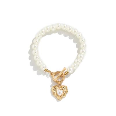 China Fashion TRENDY Luxury Jewelry High Quality Pearl Gold Plated Heart Shaped Buckle OT Pendant Bracelet For Women for sale