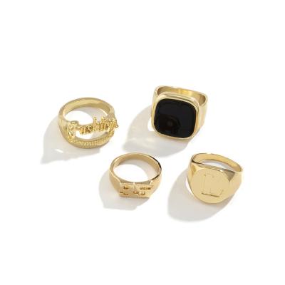 China FASHIONABLE European and American hip-hop fashion 18K drip oil craft four gold plated ring set ladies wholesale for sale