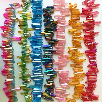 China Europe Rainbow Aura Titanium Coated Crystal Points Quartz Polished Sticks Spikes Point Beads for sale