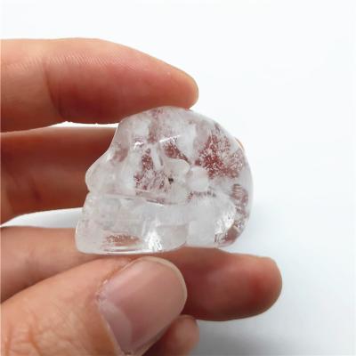 China Europe Wholesale Natural Hand Carved High Quality Clear Crystal Skulls for sale