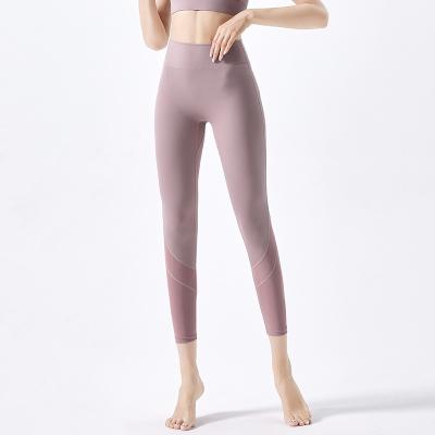 China Wholesale Mesh Stitching Yoga Pants Women High Butt Breathable Bodybuilding Waist Lifting Nine Point Sports Fitness Tight Pants for sale