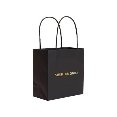 China Recyclable Customized Twist Handles Black Print Recycled Kraft Paper Gift Paper Boutique Shopping Bag With Gold Foil Logo for sale