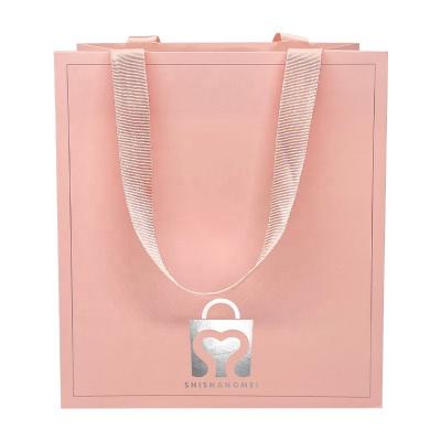 China Hot Sales Recyclable Eco Recycling Art Paper Bags With Gold Stamping Your Own Logo Gift Apparel Shopping Paper Bags for sale