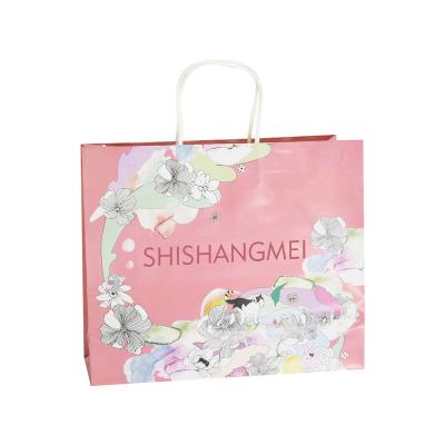 China Fancy Kraft Recyclable Eco-Friendly Shopping Paper Bags With Twisted Handle Custom Logo Cosmetics Small Pink Retail Paper Bags for sale