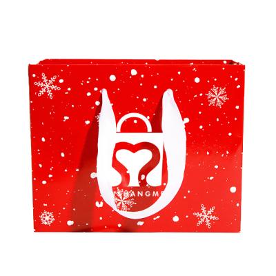 China Recyclable Custom Logo Printing Red Gift Art Packaging Bags Christmas Shiny Paper Bags With Ribbon Handles for sale