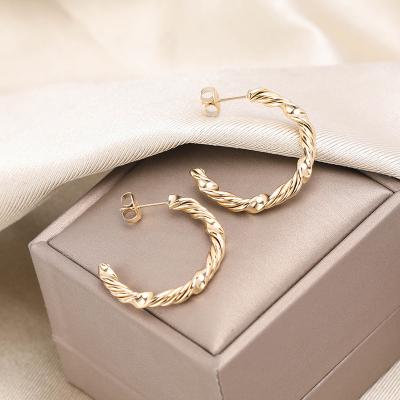 China FASHIONABLE hot selling high quality gold plated stainless steel piercing earrings for sale