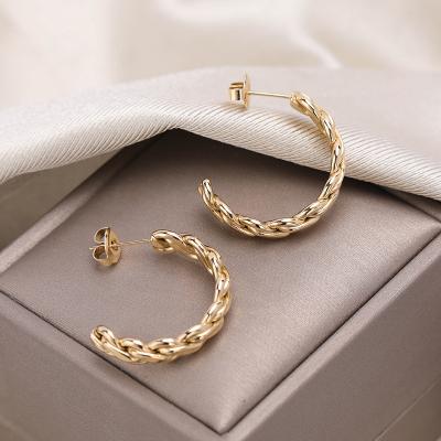 China FASHIONABLE hot selling high quality gold plated stainless steel piercing earrings for sale