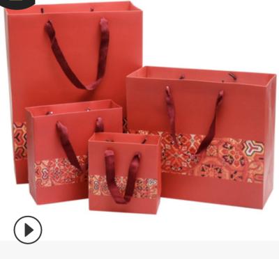 China Recyclable Chinese Style New Year's Day Paper Bag Packaging Handheld Gift Bags for sale