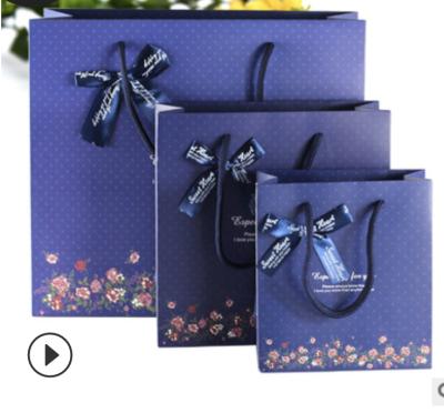 China Recyclable Korean Exquisite Dark Blue Small Bottom Gift Bag Custom Paper Bag Custom for sale