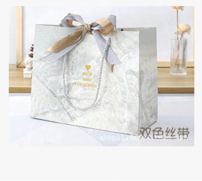 China INS Style Recyclable Gifts Marbled Packaging Fashion Gifts Wedding Candy Apparel Store Custom Paper Bags for sale