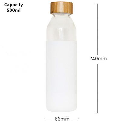 China Sustainable Logo Bamboo Bottle Drinking Glass Heat Resistant Custom Water Bottle With Silicone Sleeve for sale