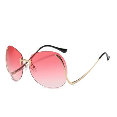 China Fashion Sunglasses Brand Designer New Fashion Rimless Bend Leg Trendy Colorful Glass Women Oversized Sunglasses 2023 Sun Glass Shades for sale