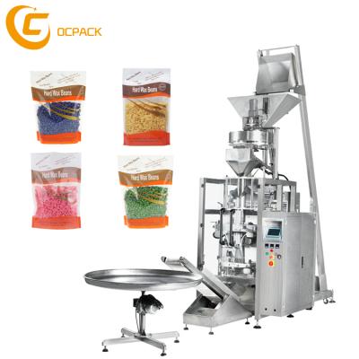 China More CLOTHING Poucg Bag Cup Volumetric Metering Pulses Packing Machine For Pellet Beans for sale