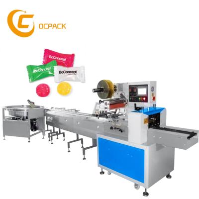 China Three servo motor high speed hard candy packaging machine horizontal peanut candy candy packing machine for sale