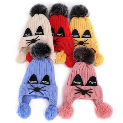 China Image 2021 Winter Children Plus Warm Fleece Beanie Letter Wool Knitted Hats Baby Boys Girls Hearing Protection Hat for sale