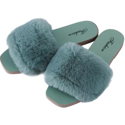 China New light hair winter slippers female cotton home warm fashion wear a word plush sandals for sale