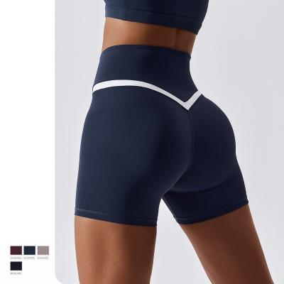 China Seamless Multicolor Scrunch Yoga Shorts Women's V Cross Waist Tights Quick Dry Fitness Running Shorts Women for sale