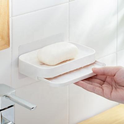 China Viable Creative Magic Soap Holder Free Punch Wall Hanging Bathroom Sticker Soap Box for sale