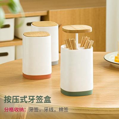 China Sustainable Universal Dental Floss Cotton Division Toothpicks Japan Style Automatic Squeezing Box for sale