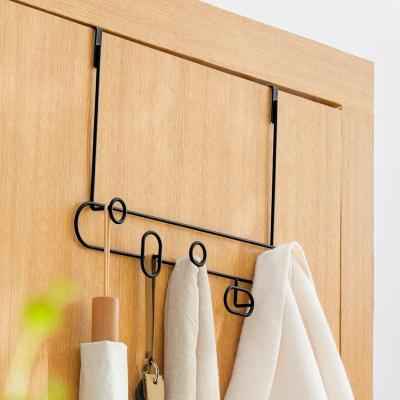 China Modern Bedroom Door Hanging Wrought Iron Storage Shelf Hanger Clothes Hook Behind Door for sale