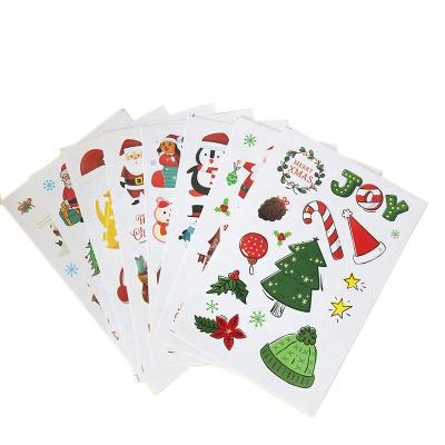 China Eco-friendly Christmas Sticker Custom Holiday Decorate Gift Paper Decoration Christmas Sticker In Hand And Window for sale