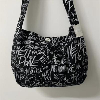 China High quality large capacity shoulder bag logo printed security graffiti canvas messenger bag for sale