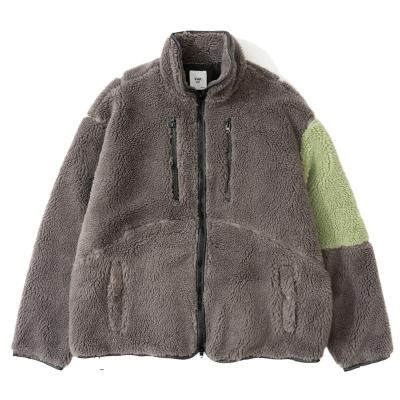 China Color Block Outdoor Color Block Men Women Anti-Wrinkle Trend Zipper Pocket Fleece Coat Winter Thick Warm Windproof Coat for sale