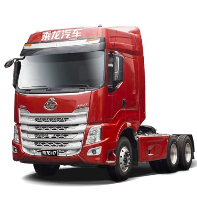 China Professional Made Truck Head H7 6*4 Tractor Truck Left Hand Drive Tractor Actors Truck 6910mm*2525mm*3895mm for sale